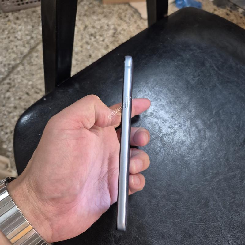 Q6+